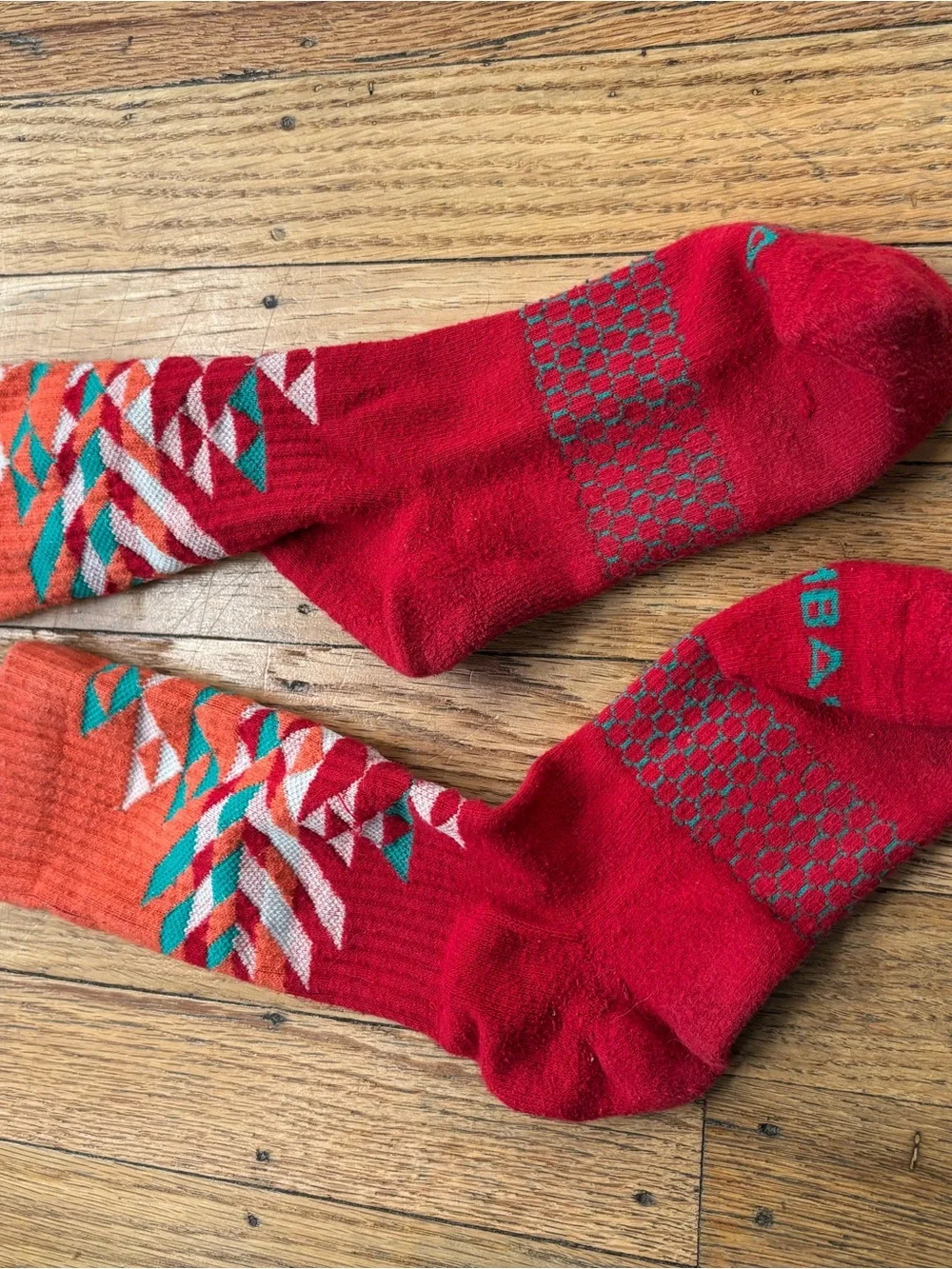 Bombas Red Athletic Crew Socks with Orange and Teal Pattern